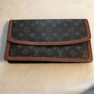 Authentic Louis Vuitton clutch.